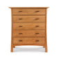 A Contemporary Craftsman 5-Drawer Chest from Vermont Furniture Designs with metal handles on a white background.