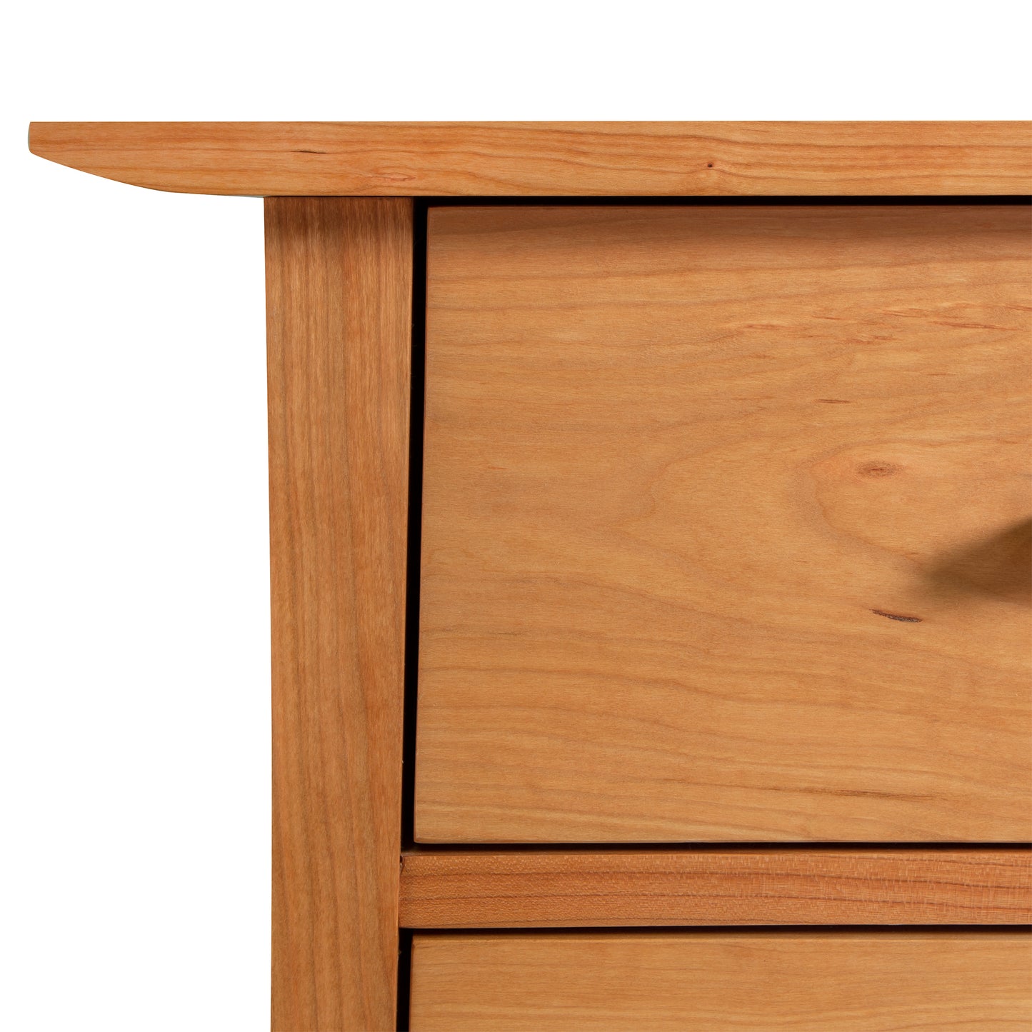 Detail of the top left corner of the Contemporary Craftsman 5-Drawer Chest by Vermont Furniture Designs, highlighting wood grain and eco-friendly oil finish.