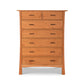 A Vermont Furniture Designs Contemporary Craftsman 7-Drawer Chest with seven evenly spaced, horizontal drawers, each with a single centered handle and an eco-friendly oil finish, standing against a white background.