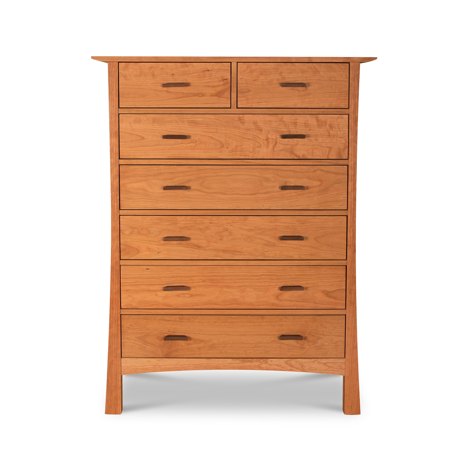 A Vermont Furniture Designs Contemporary Craftsman 7-Drawer Chest with seven evenly spaced, horizontal drawers, each with a single centered handle and an eco-friendly oil finish, standing against a white background.