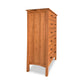 Vermont Furniture Designs Contemporary Craftsman 7-drawer tallboy dresser with multiple drawers on a white background.