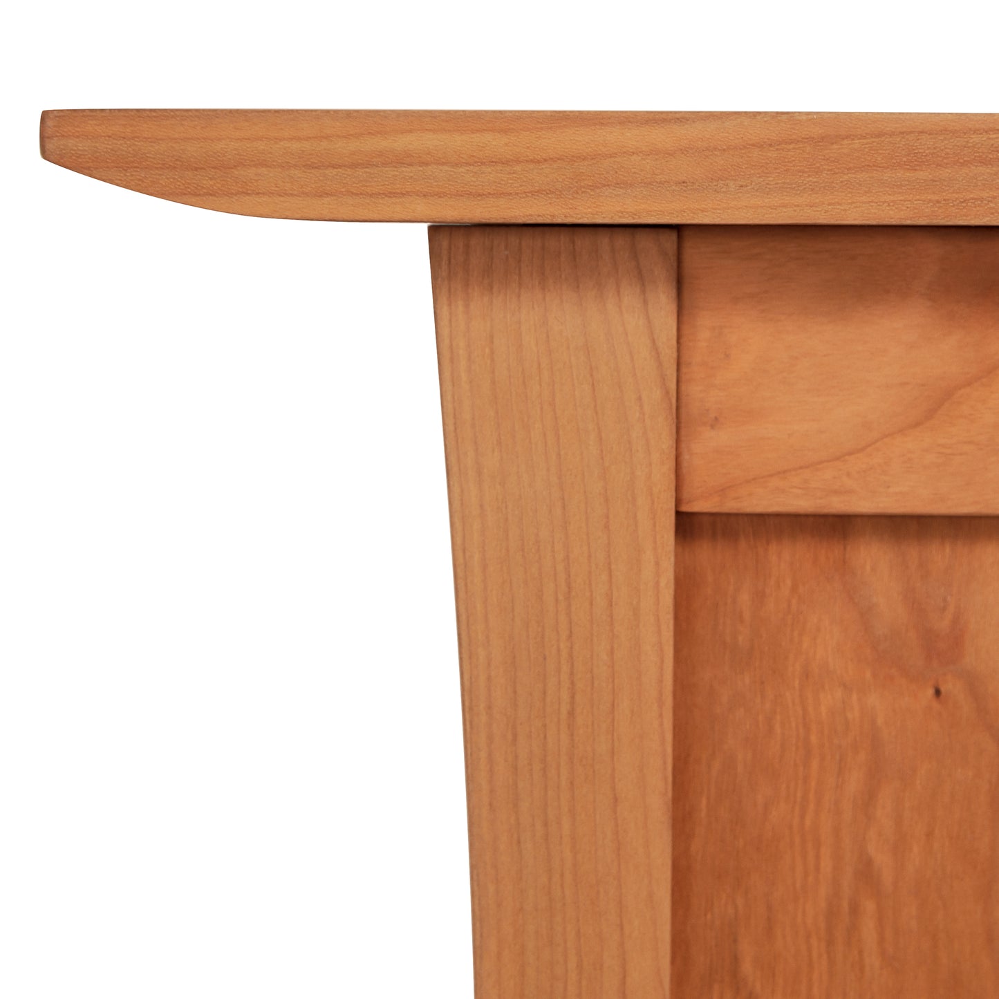 Contemporary Craftsman Blanket Chest by Vermont Furniture Designs highlighting finely crafted edge and sturdy leg, exemplifying quality woodworking.