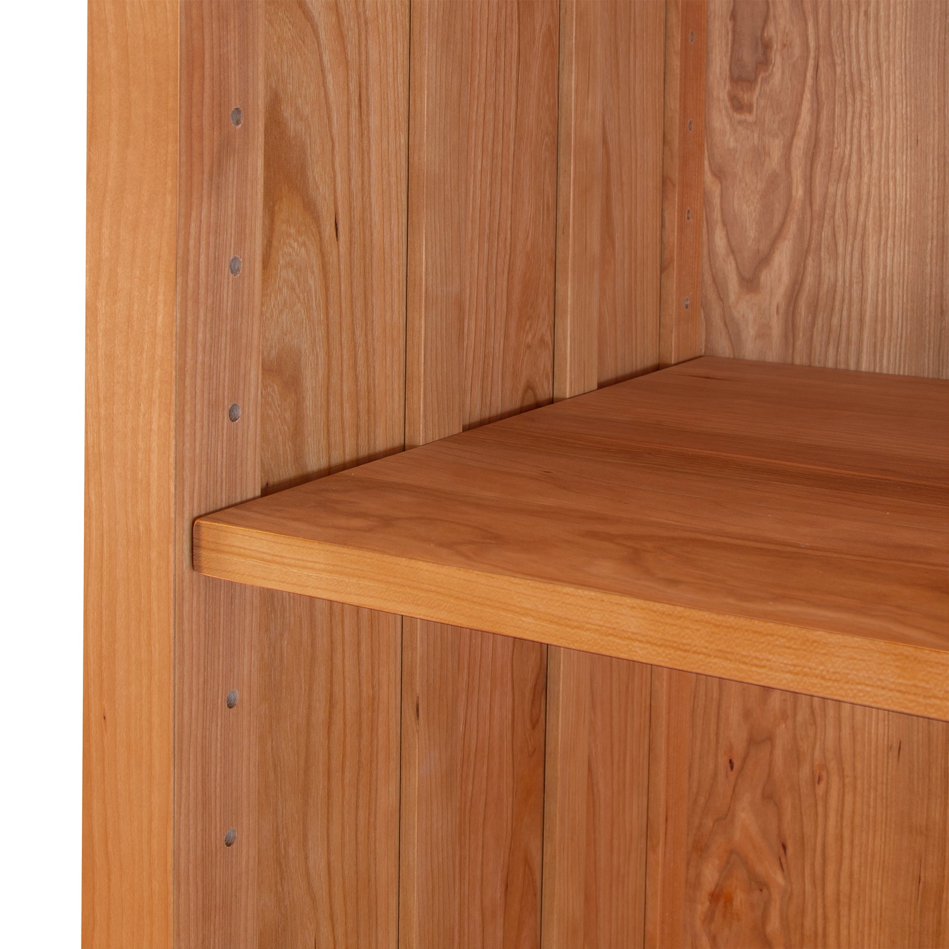 Contemporary Craftsman Custom Bookcase by Vermont Furniture Designs, crafted from eco-friendly wood with visible grain and metal fasteners, showcasing fine American craftsmanship.