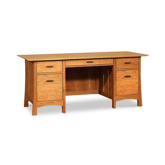 Vermont Furniture Designs Contemporary Craftsman Executive Desk with multiple drawers and a central knee-hole space on a plain white background.