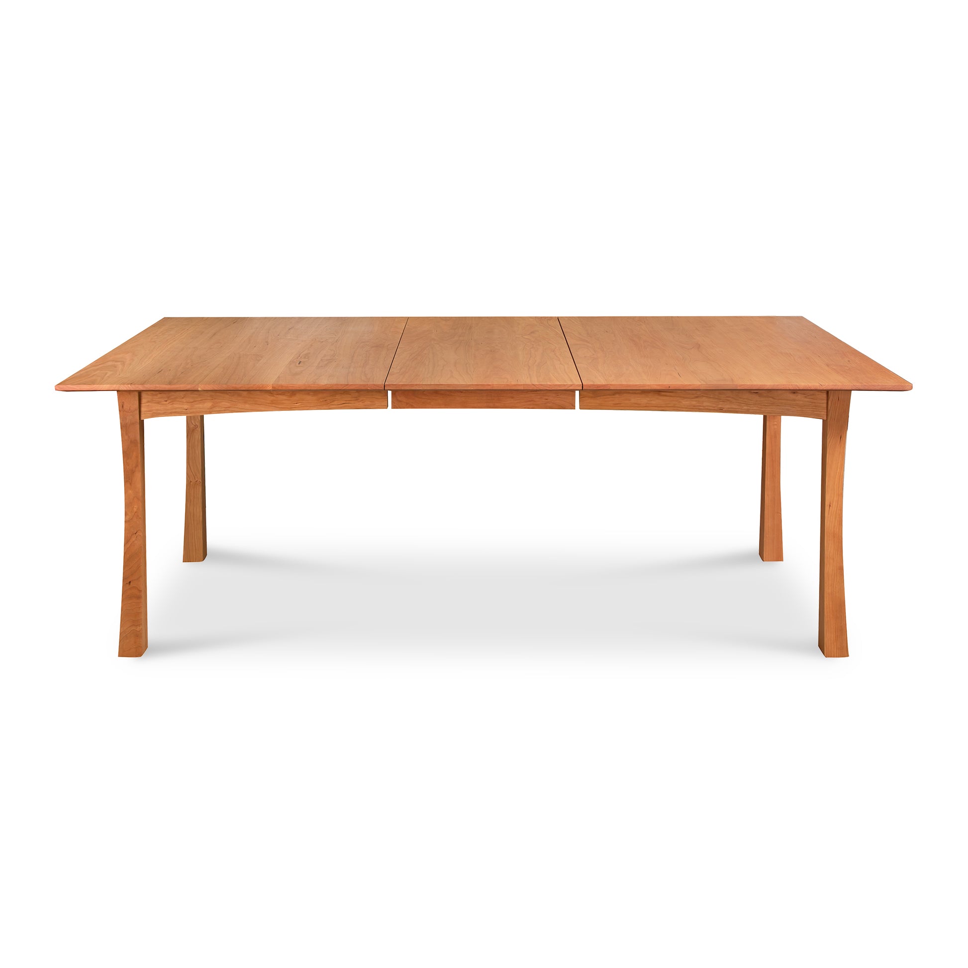 Contemporary Craftsman Extension Dining Table by Vermont Furniture Designs, showcasing solid wood construction, center seam, and precision-crafted four-leg design.