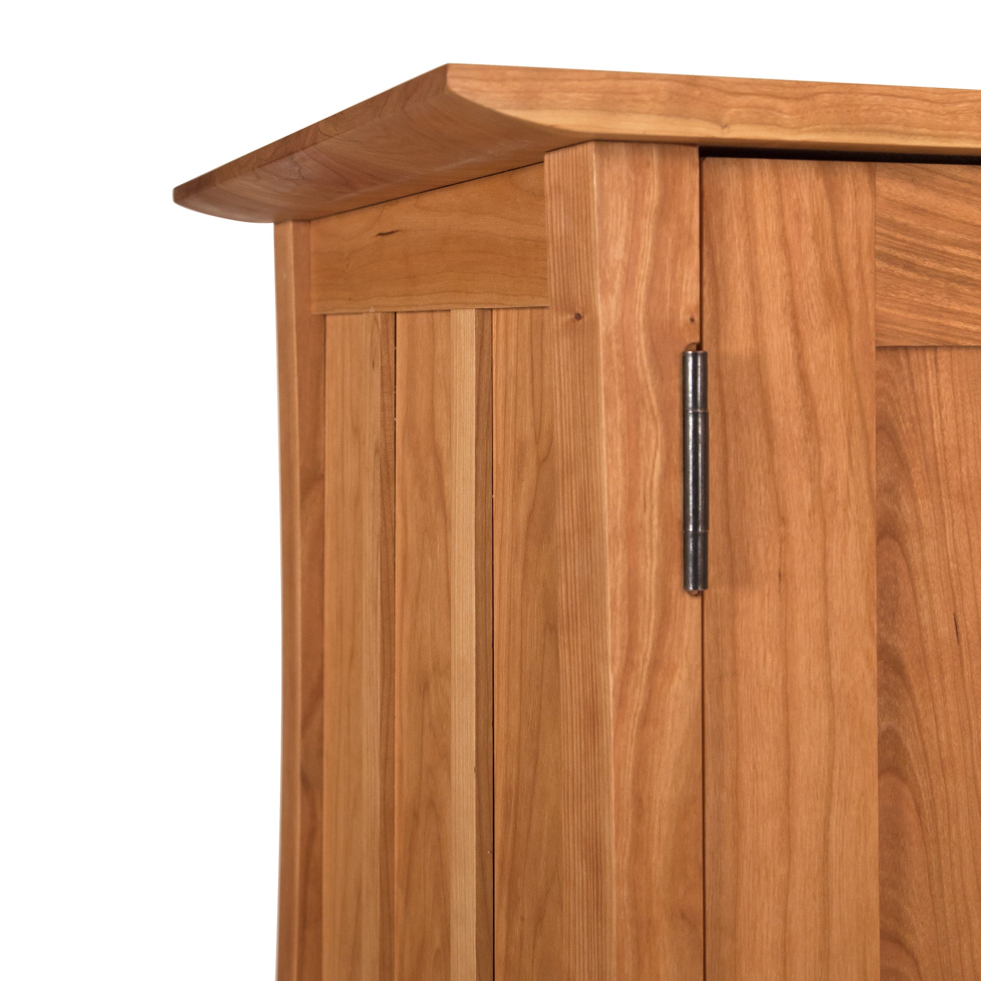 Vermont Furniture Designs Contemporary Craftsman Huntboard highlighting unique hinge, rich grain pattern, and distinctive overhang top.