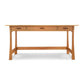 A Vermont Furniture Designs Contemporary Craftsman Library Desk with two drawers.