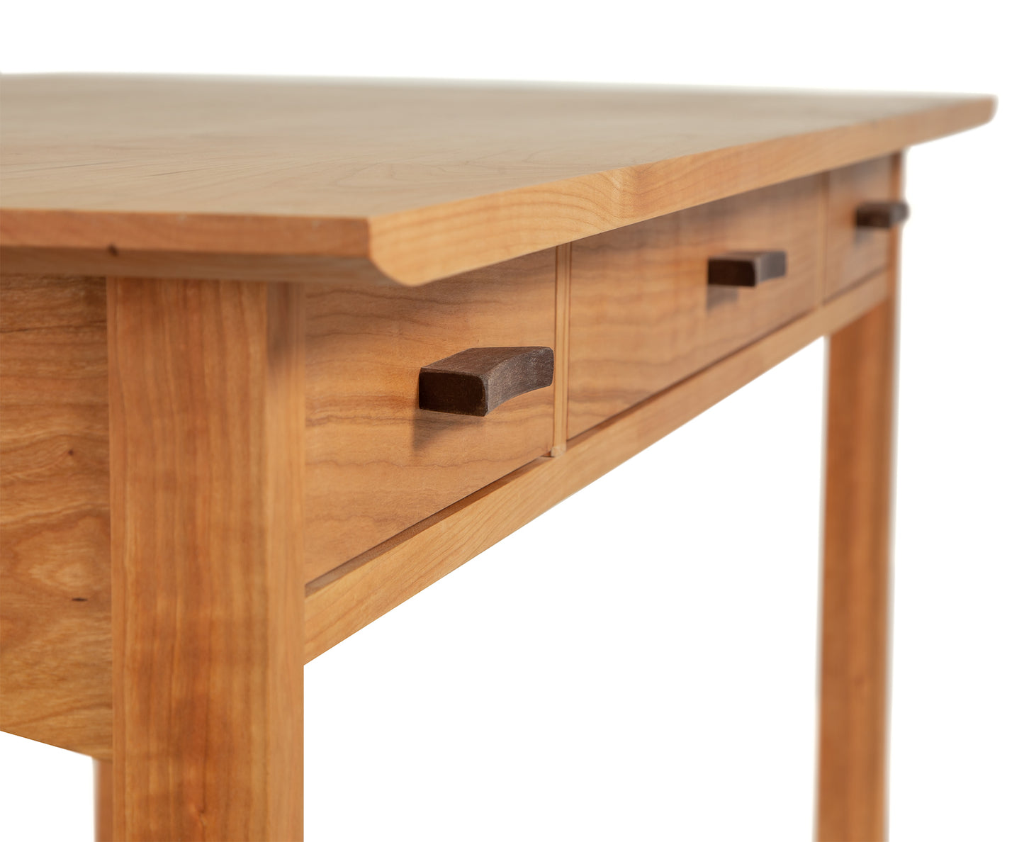 Contemporary Craftsman Library Desk, solid Cherry Maple Walnut with a visible drawer and tapered legs, isolated on a white background, by Vermont Furniture Designs.
