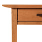 A Contemporary Craftsman 1-Drawer Open Shelf Nightstand by Vermont Furniture Designs, now an eco-friendly furniture piece, featuring a single drawer with a dark handle, against a plain white background.