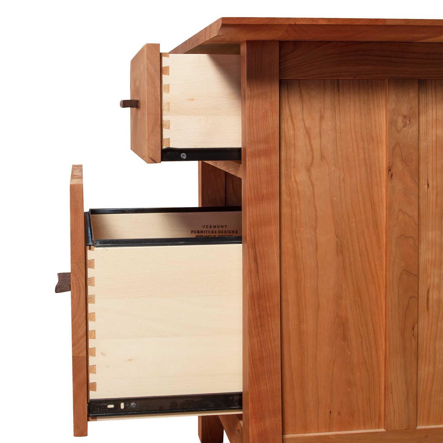 A Contemporary Craftsman Study Desk by Vermont Furniture Designs with two drawers partially open, showcasing dovetail joint construction and eco-friendly finish.