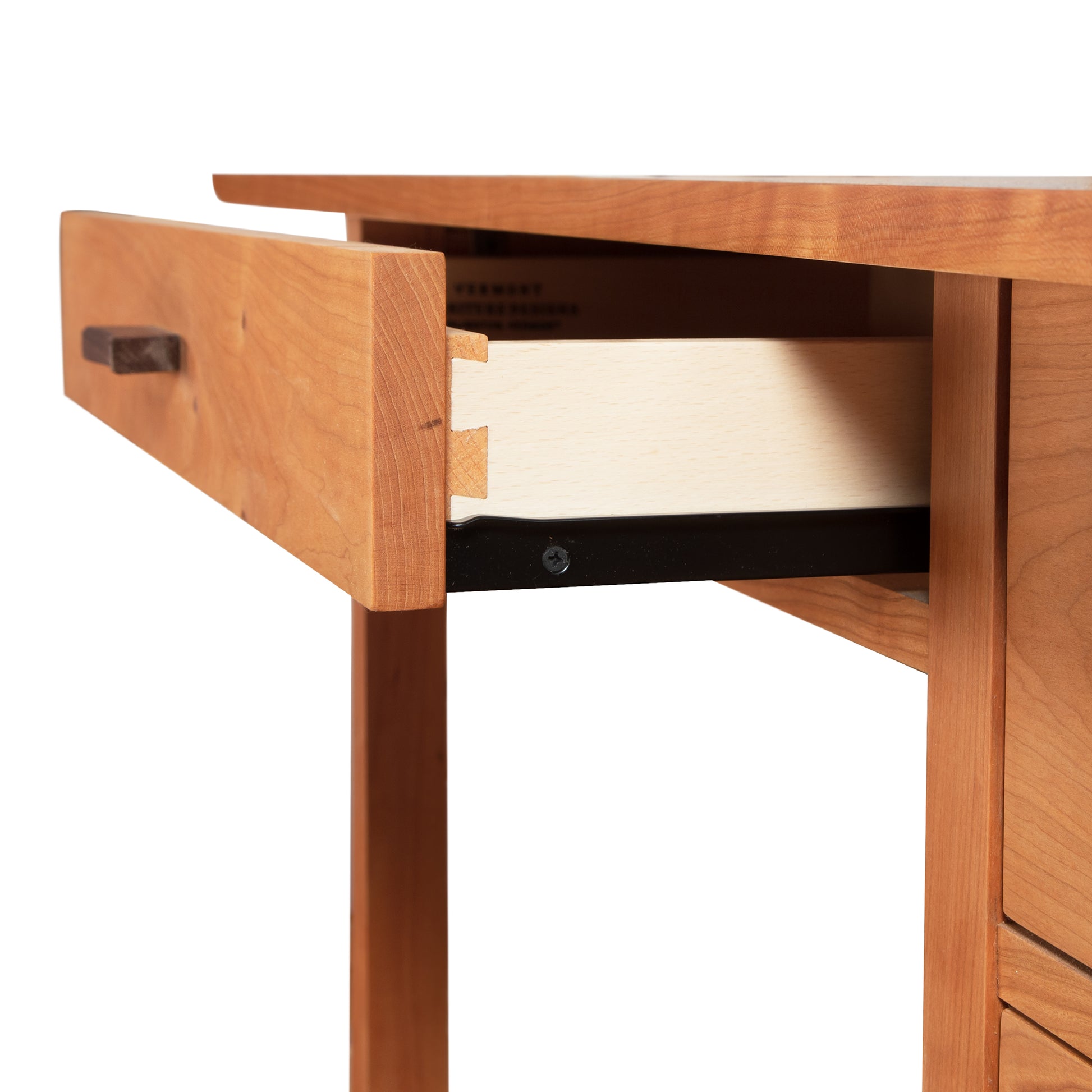 Contemporary Craftsman Study Desk by Vermont Furniture Designs, featuring an open drawer that highlights detailed dovetail joinery.