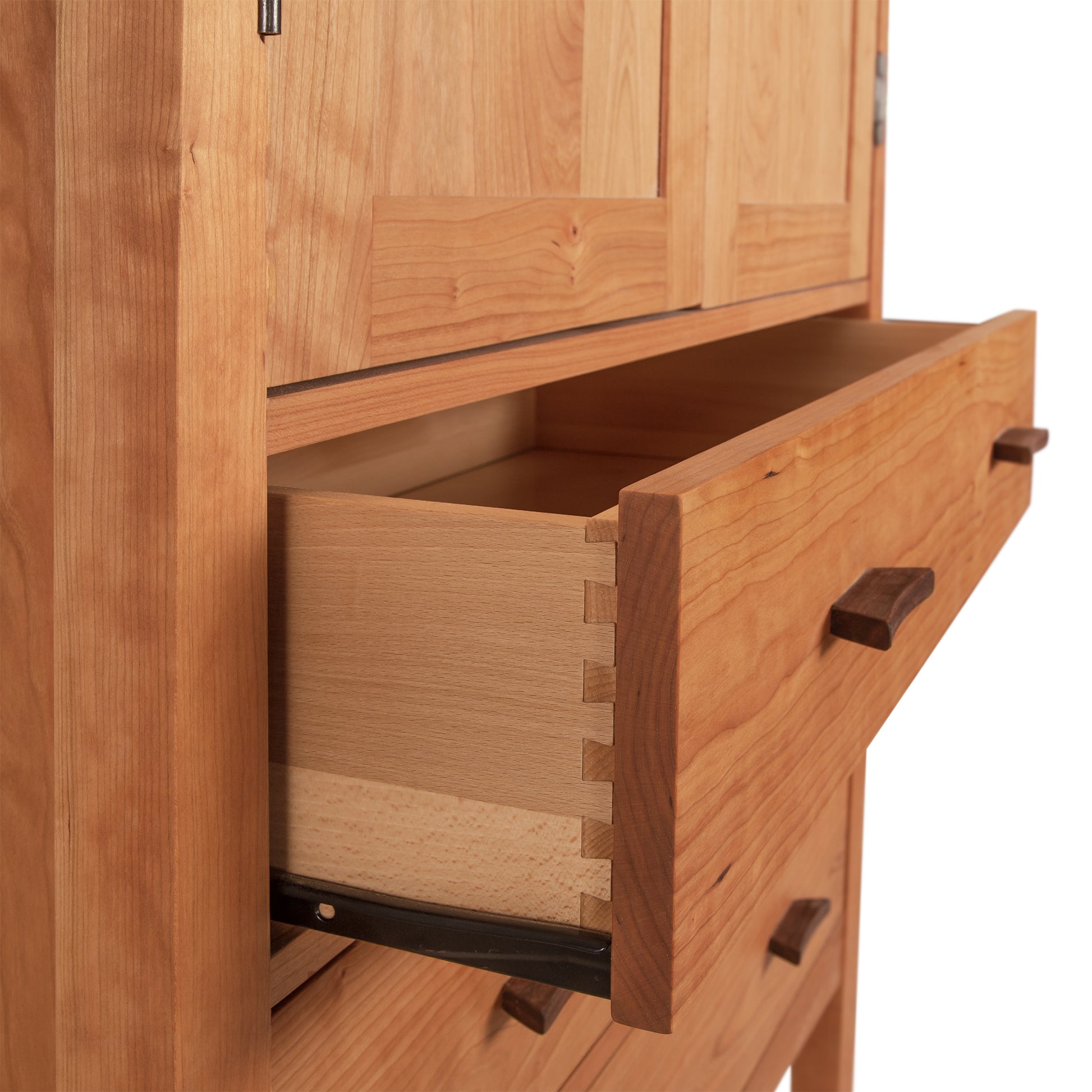 Contemporary Craftsman Tall Armoire showcasing expert dovetail joinery and natural solid wood, handcrafted by Vermont Furniture Designs.