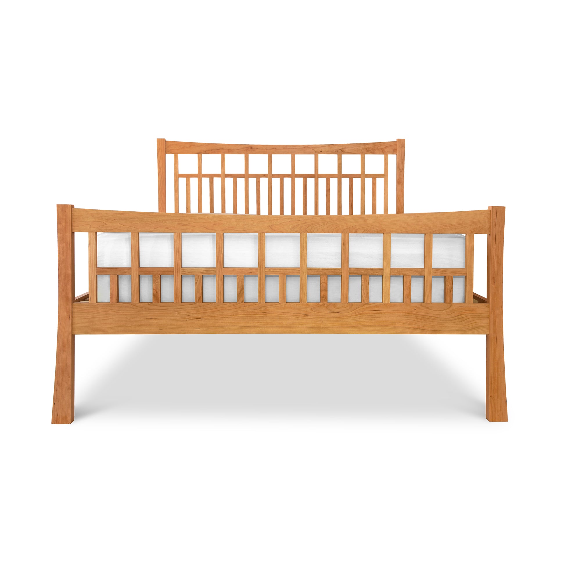 Contemporary Craftsman High Footboard Bed with Wooden Slatted Frame and White Mattress by Vermont Furniture Designs.