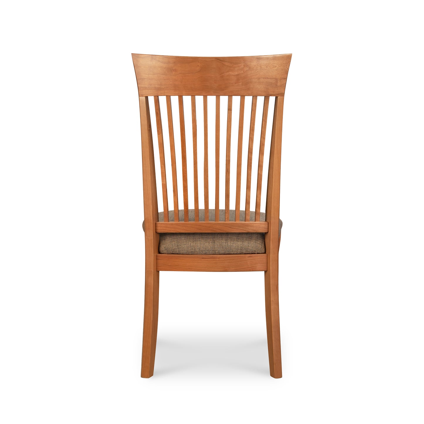 A wooden dining chair with a tan seat.