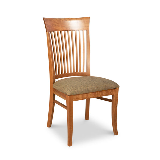 A Vermont Woods Studios Contemporary Shaker Side Chair 6-Piece Set - Clearance with a vertical slat back design and an upholstered seat crafted from natural cherry wood, showcased against a white background.