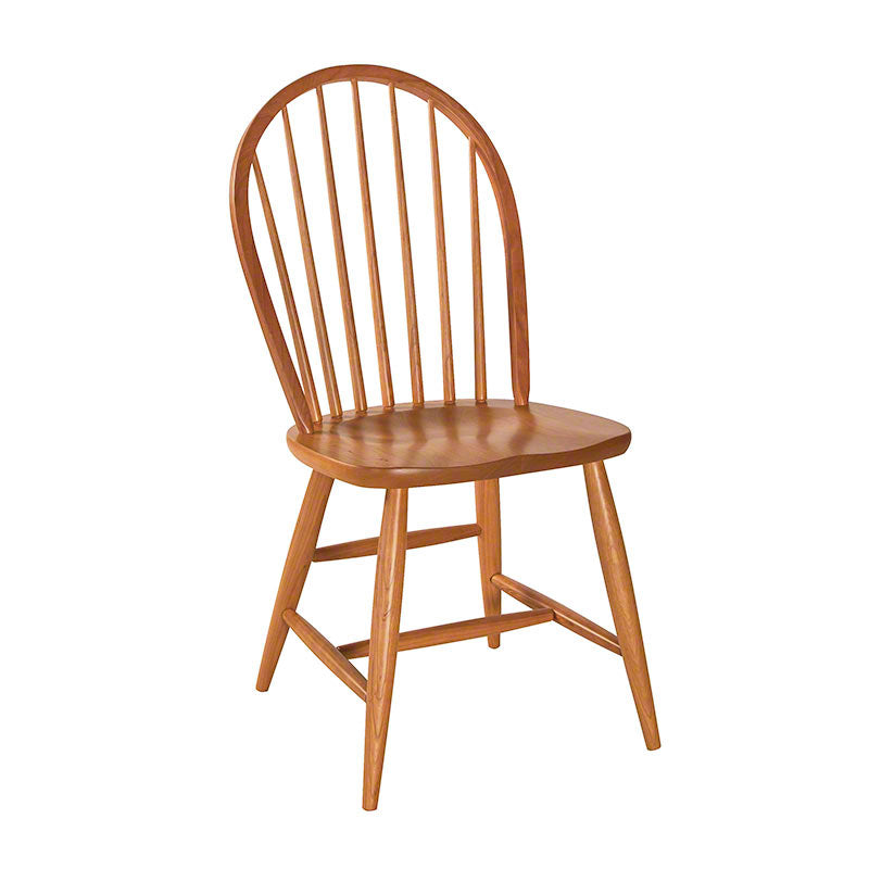 A wooden dining chair on a white background.
