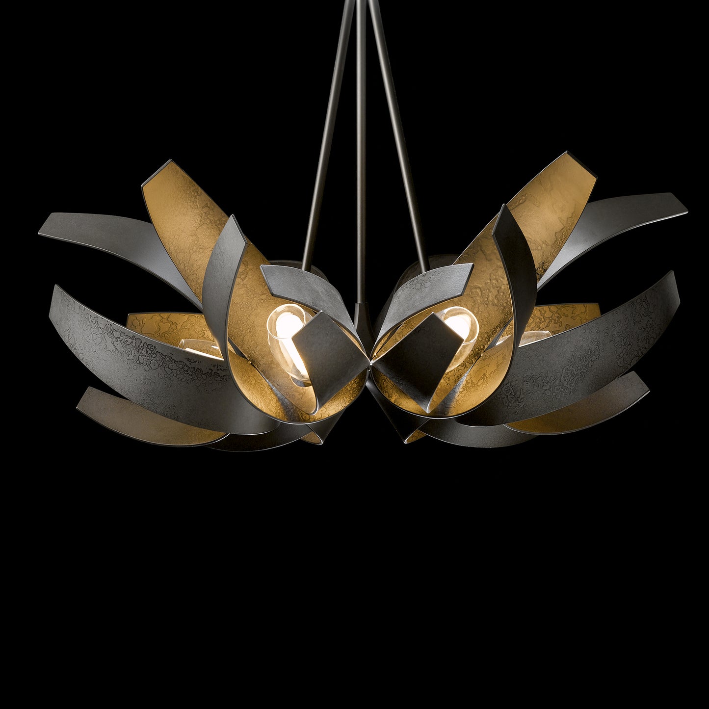 Interlocking black and gold metal Hubbardton Forge Corona Pendant with two exposed bulbs.