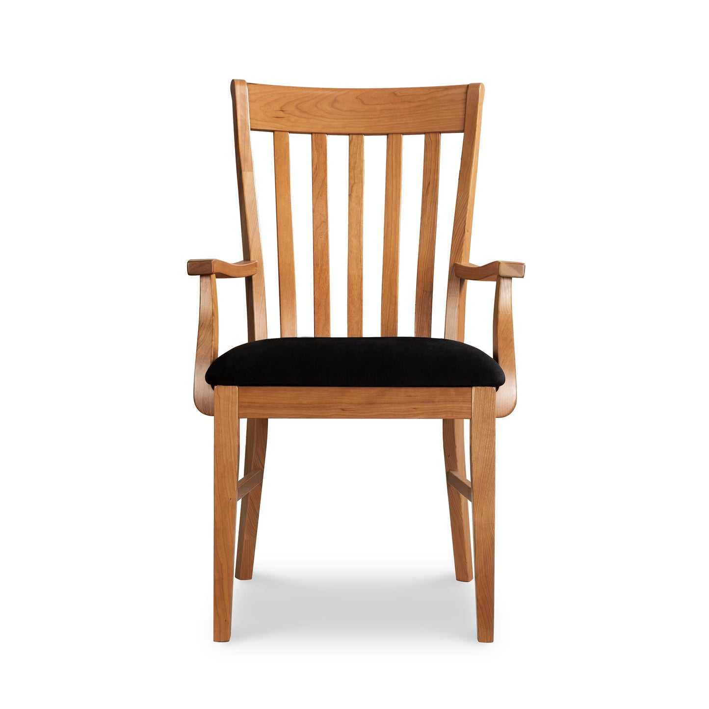 A wooden chair with black upholstered seat.