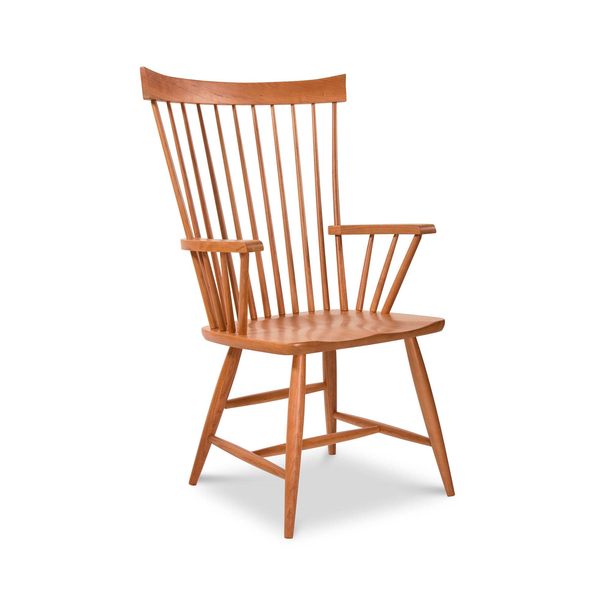 Lyndon Furniture Country Windsor Chair in natural cherry with a high spindle backrest, showcasing classic American craftsmanship.