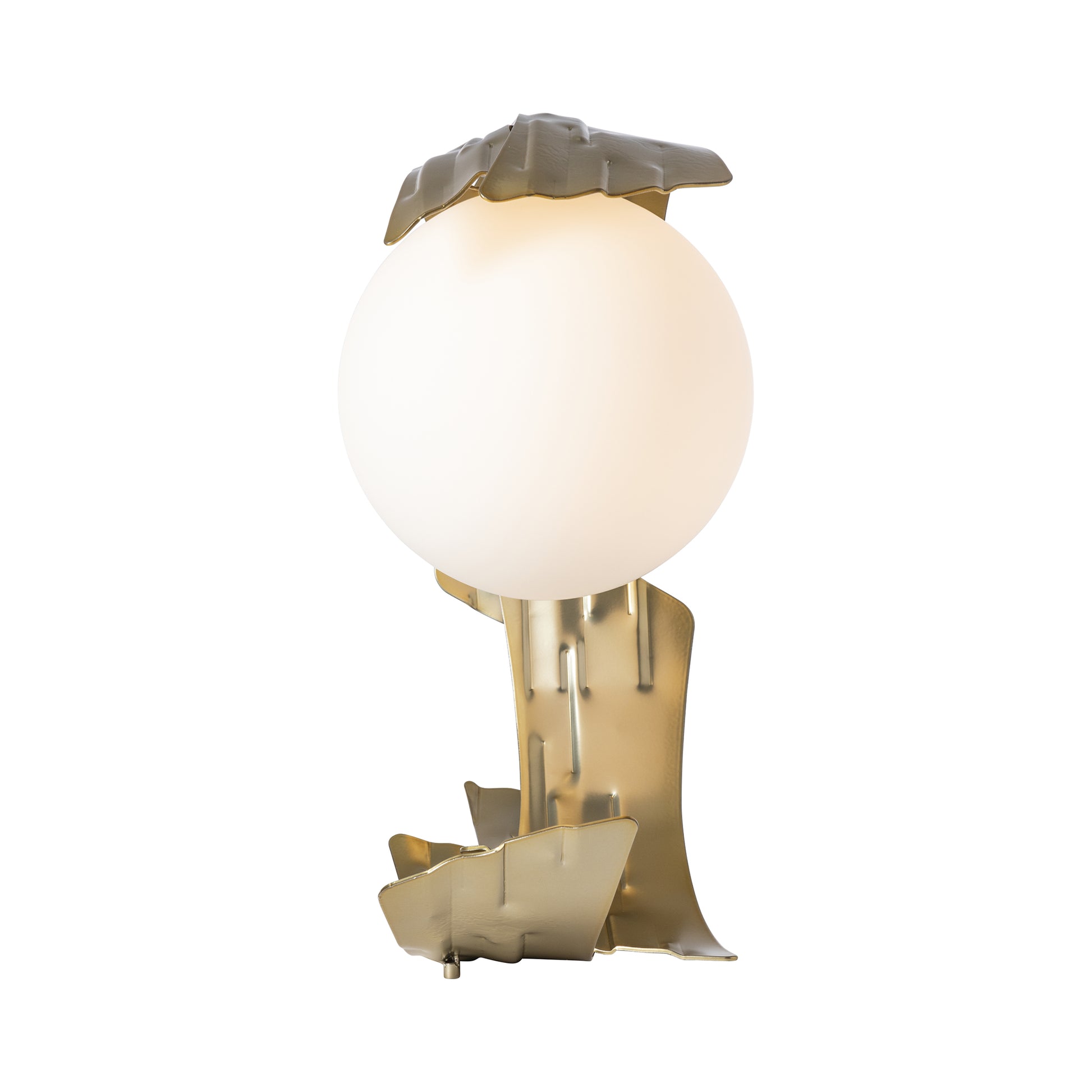 Crest Table Lamp by Hubbardton Forge with spherical light and abstract Modern Brass base featuring jagged leaf designs.