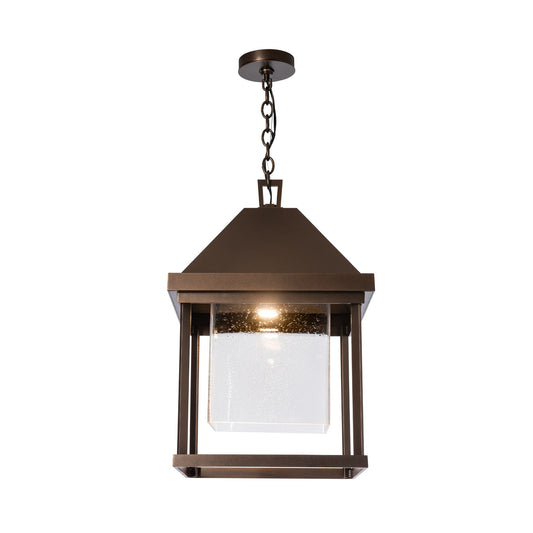 Hubbardton Forge Dorset outdoor lantern with square black frame and clear glass panels, showcasing handcrafted American-made design.