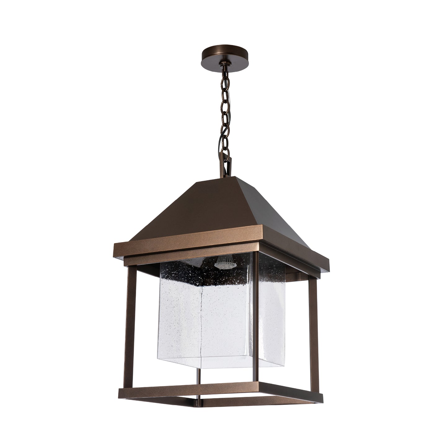 Hubbardton Forge Dorset Outdoor Lantern with square metal frame, clear glass panels, and ceiling-mount chain, designed for dark sky compliance.