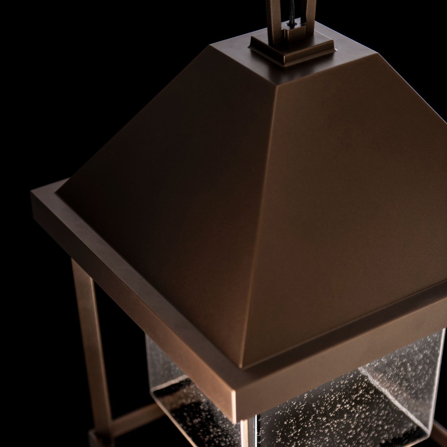 Dorset Dark Sky Friendly Outdoor Lantern by Hubbardton Forge, featuring Coastal Bronze finish, glass panels, and a pyramid roof design.