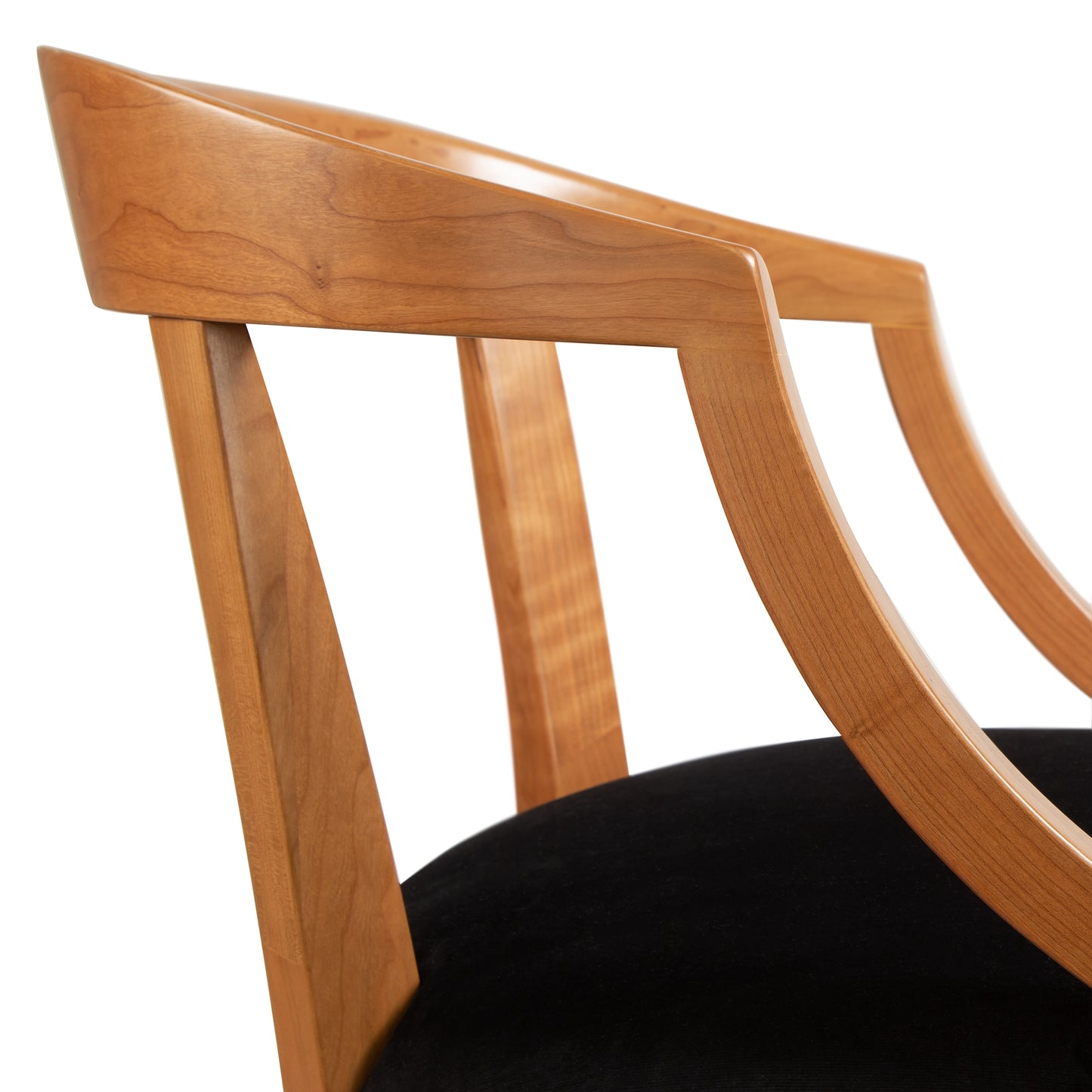 Dorset Chair by Vermont Woods Studios, featuring a Bank of England style with a curved backrest and black cushioned seat, showcased against a plain white background.