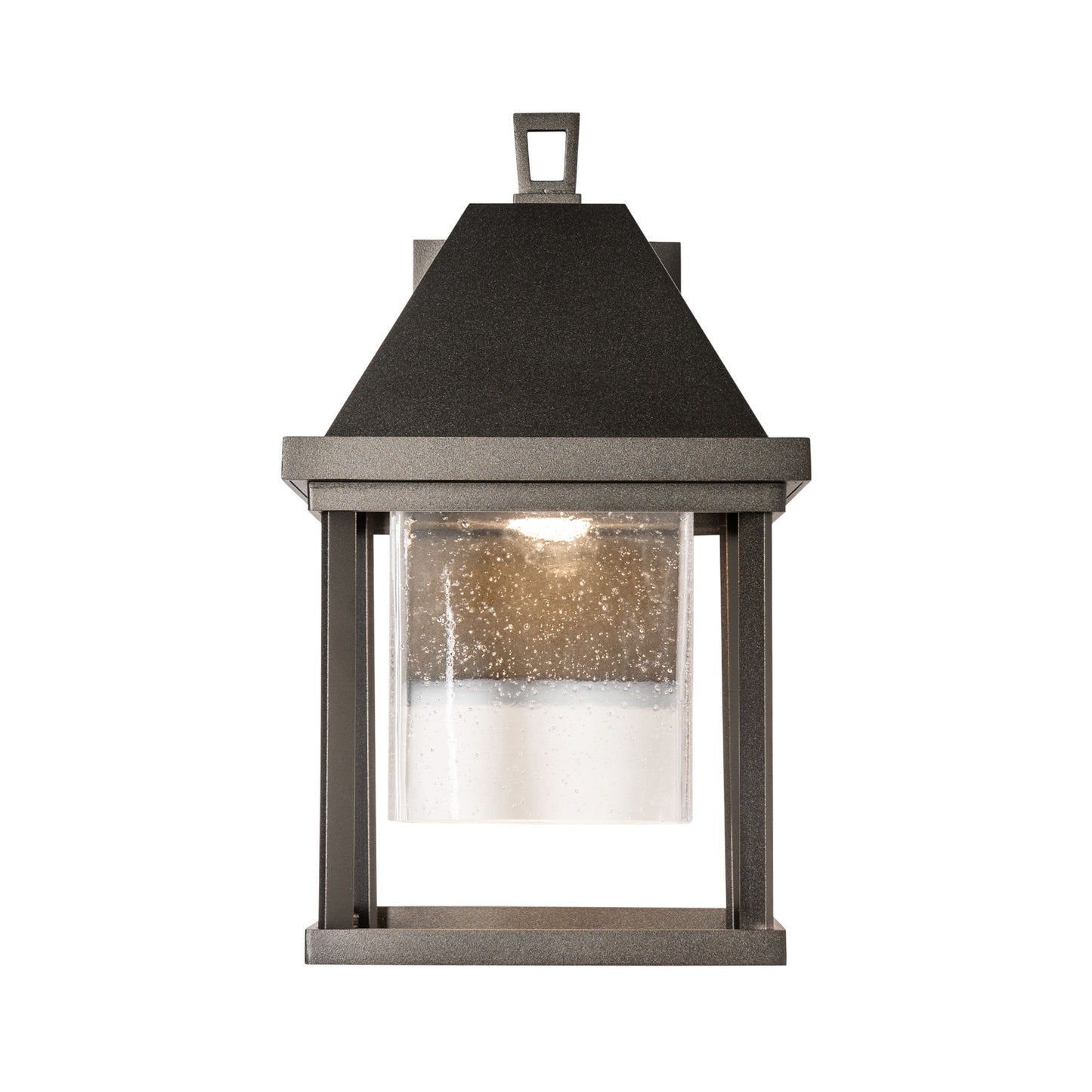 Dorset Small Outdoor Sconce by Hubbardton Forge with clear seeded glass and dark metal frame, showcasing elegant, high-end craftsmanship.