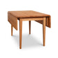A Lyndon Furniture wooden Drop Leaf Table perfect for kitchen or dining room use, ideal for family gatherings.