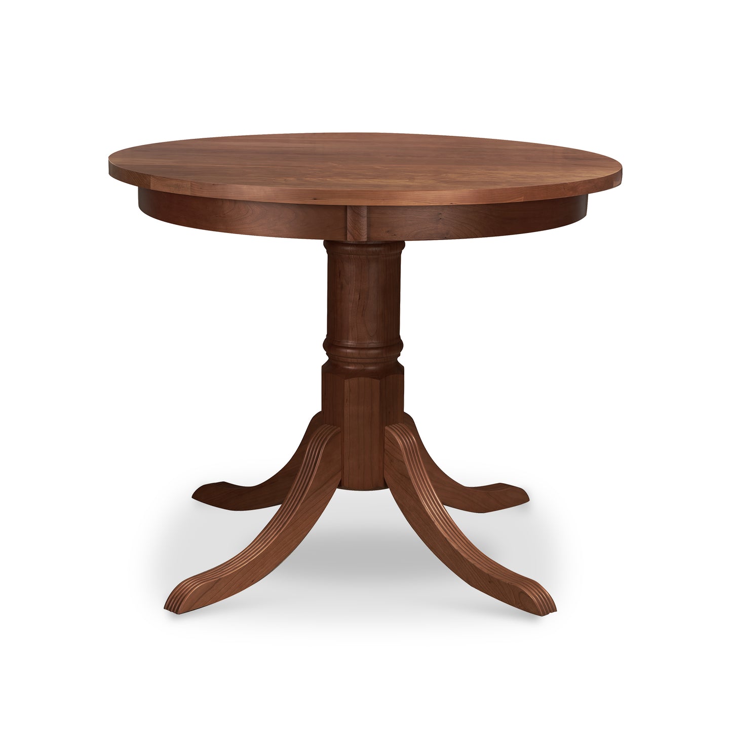 Lyndon Furniture Duncan-Phyfe round pedestal dining table with four curved legs and a timeless, classic design.