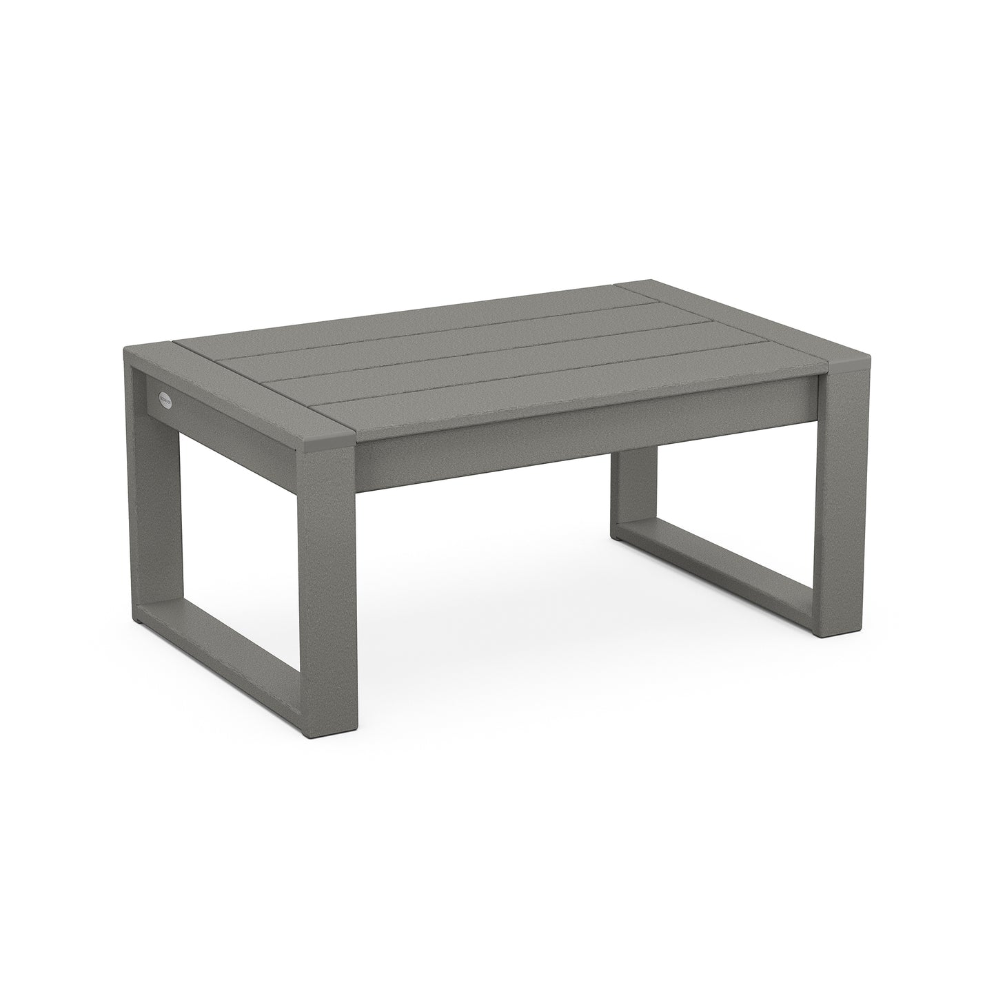 A 3D-rendered image of a simple, contemporary outdoor POLYWOOD EDGE Coffee Table in a solid grey color. The table has a rectangular top and a slightly recessed platform base made of POLYWOOD.