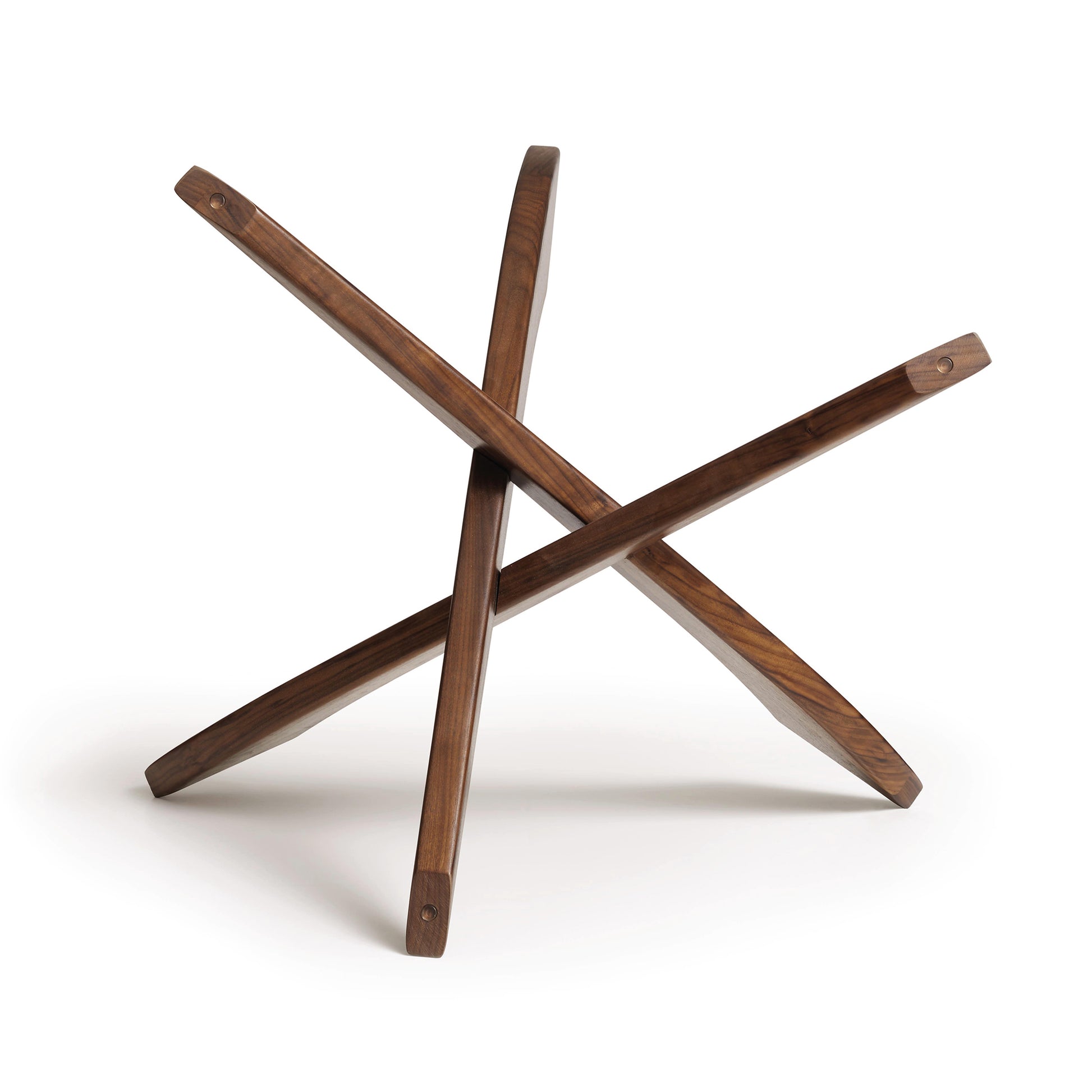 Copeland Furniture Entwine Round Coffee Table with a sculptural walnut base of three dark wood rods in a geometric design.