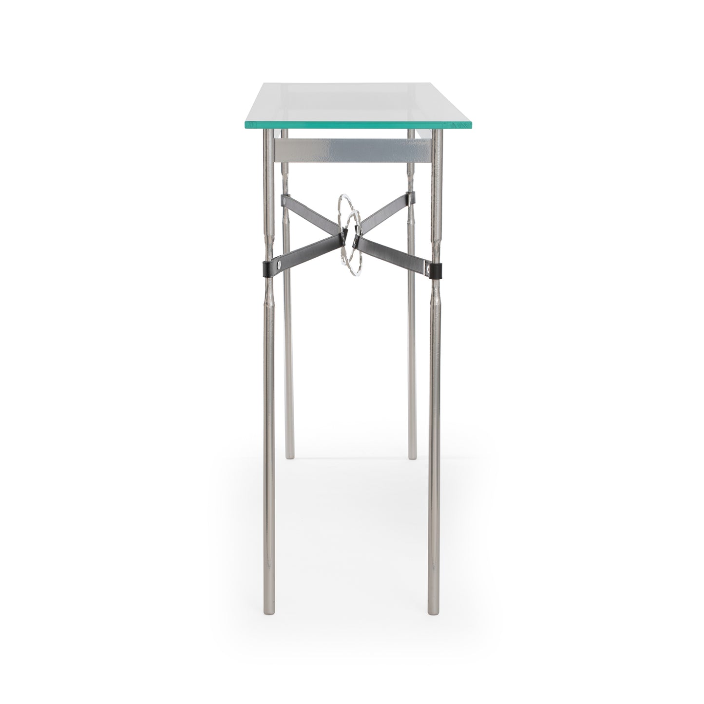 Hubbardton Forge Equus Console Table with metal frame, glass top, and decorative ring detailing. Front view highlights elegant design features.