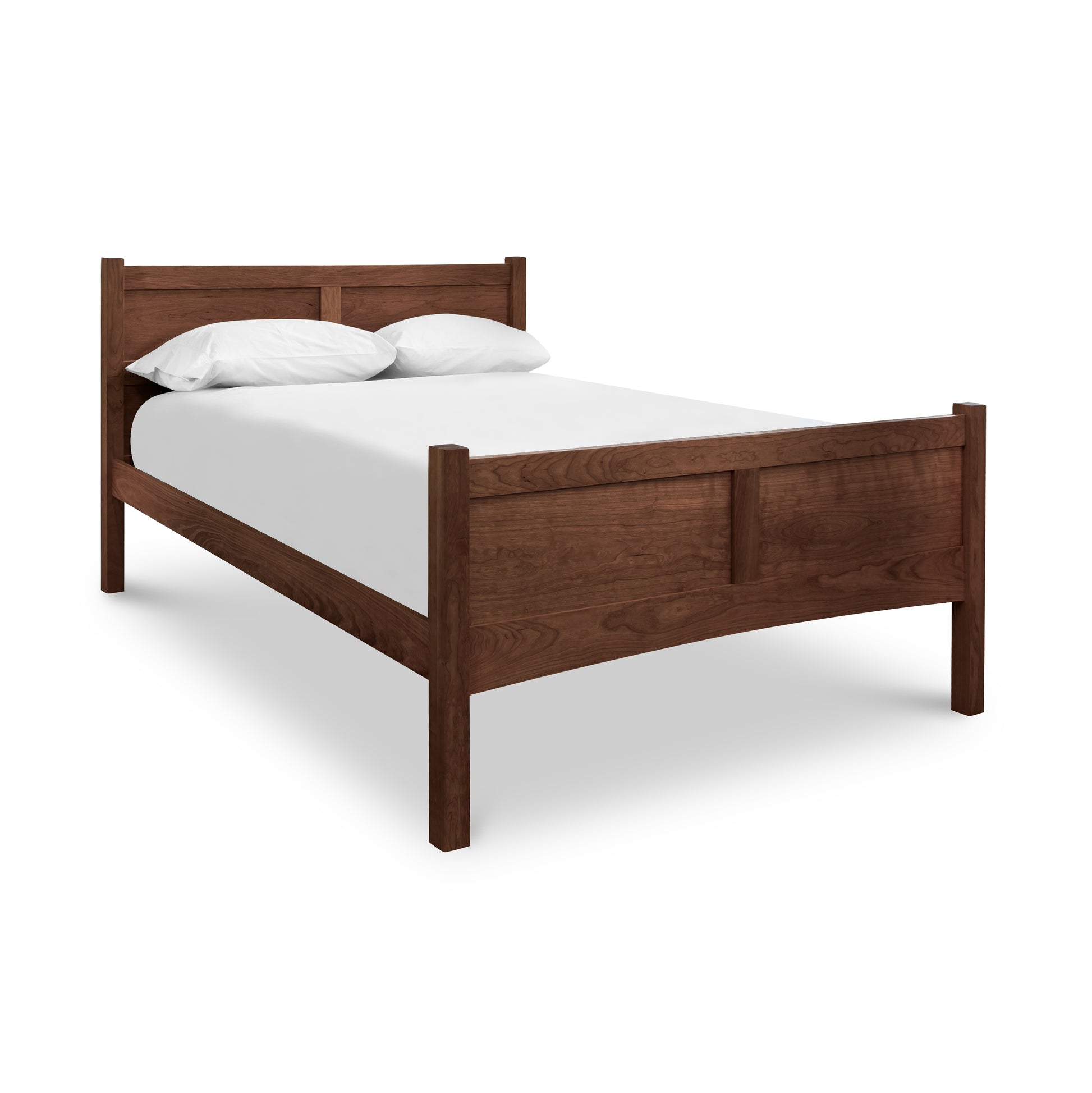 Essex High Footboard Bed from the Vermont Furniture Designs Collection with white bedding on a plain background.