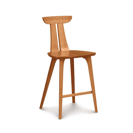 An Estelle counter stool by Copeland Furniture with a curved backrest on a white background.