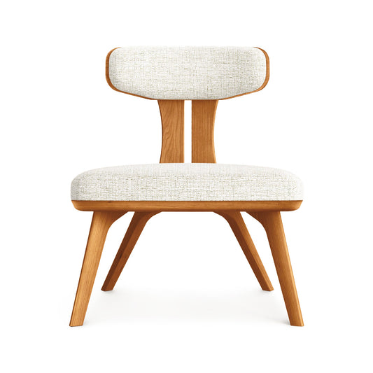 Estelle Lounge Chair by Copeland Furniture with angled legs and upholstered seat highlights American craftsmanship in solid wood construction.