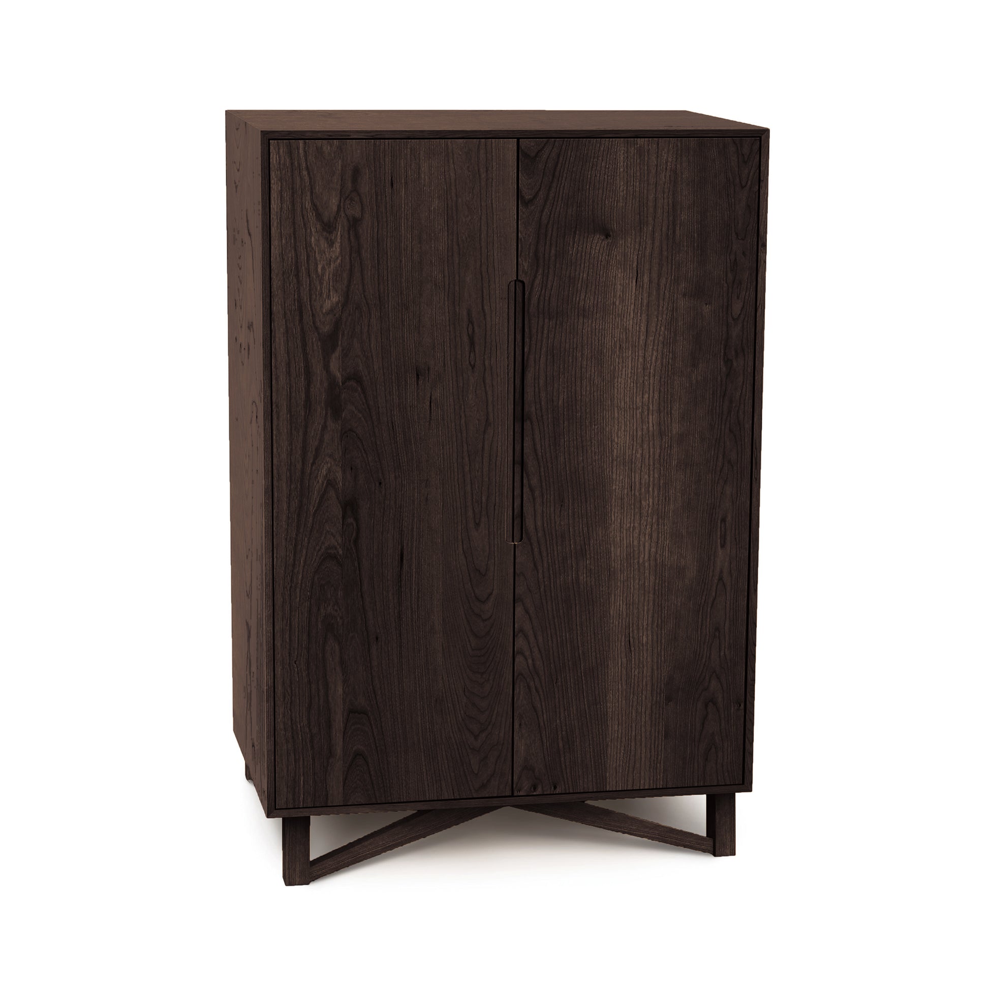 Exeter Bar Cabinet by Copeland Furniture with two doors, sleek handles, and sturdy base in mid-century modern design, crafted from high quality wood.