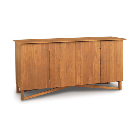 Exeter Buffet by Copeland Furniture showcasing modern design with four solid hardwood cabinet doors, crafted in high-quality wood.