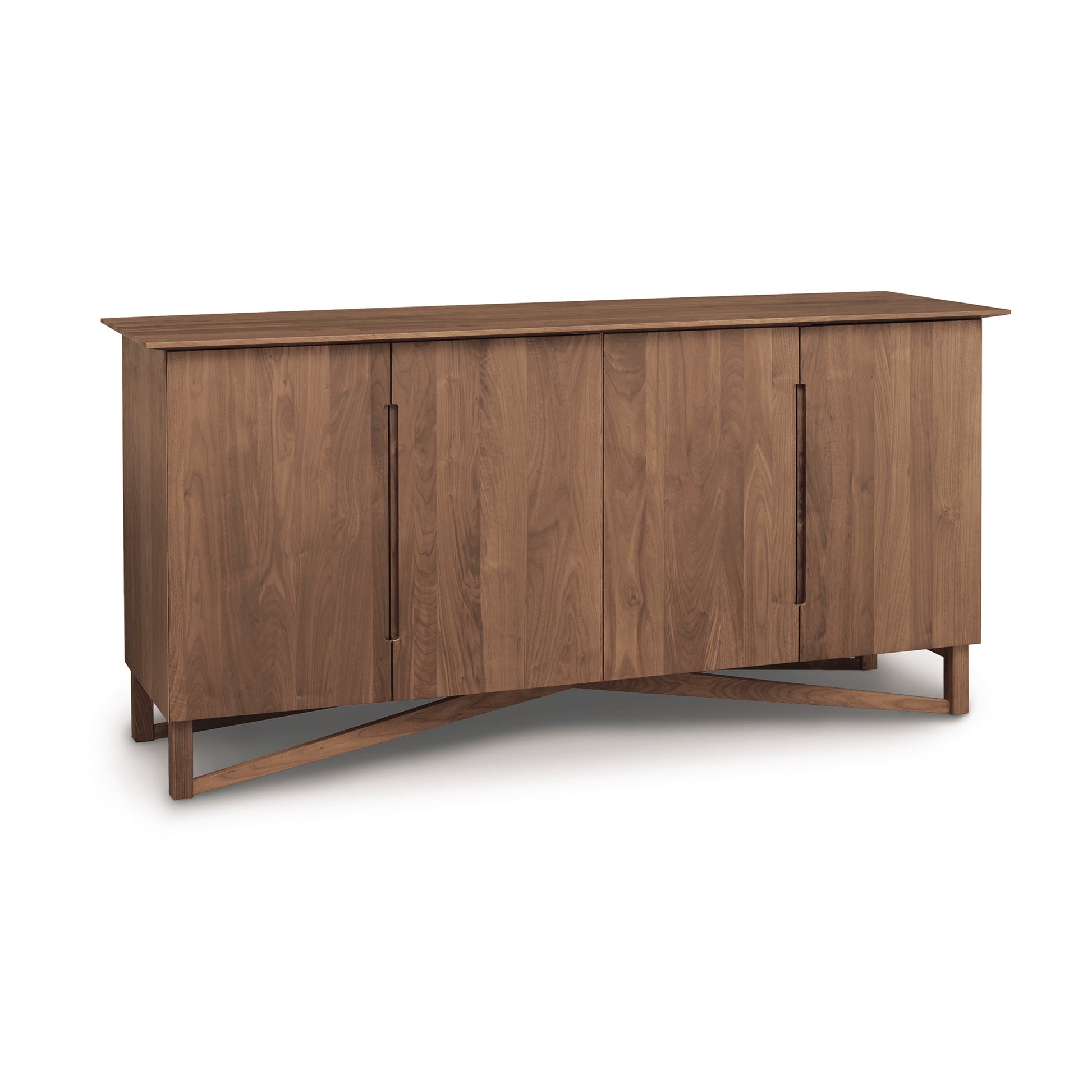 A solid natural hardwood Exeter Buffet from the Copeland Furniture Collection, with three doors and an angular leg design, isolated on a white background.