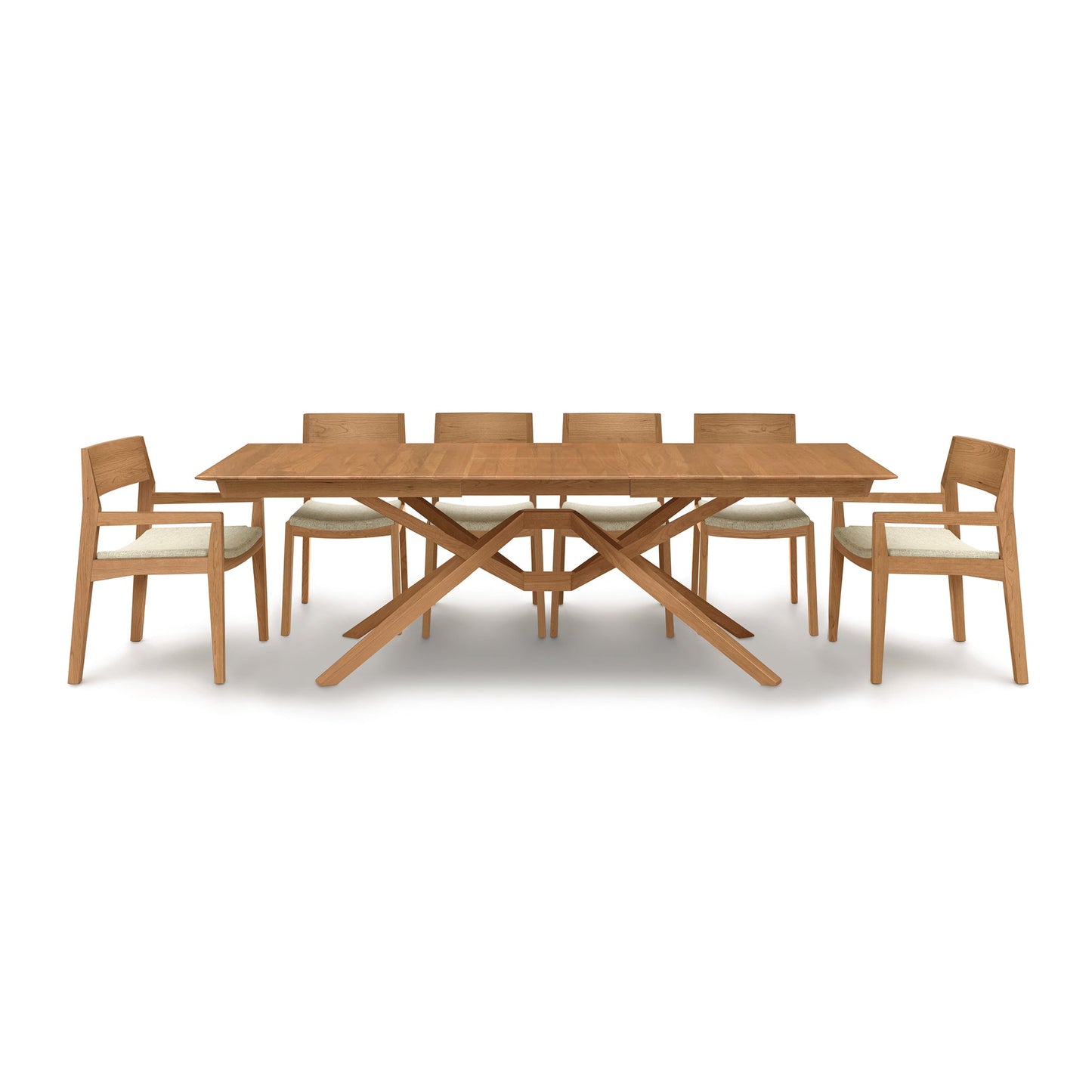 A wooden dining table with six chairs.