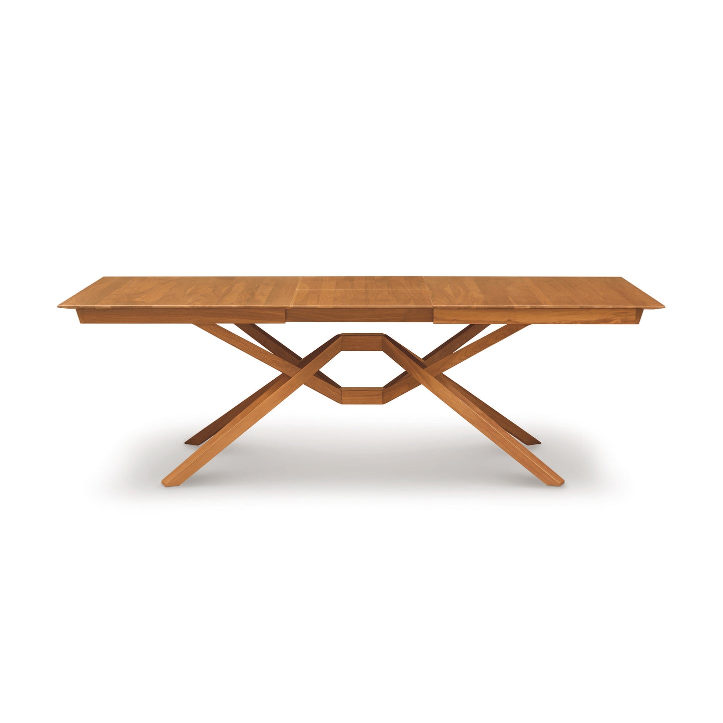 Copeland Furniture Exeter Extension Dining Table featuring a crisscross base and butterfly leaf.