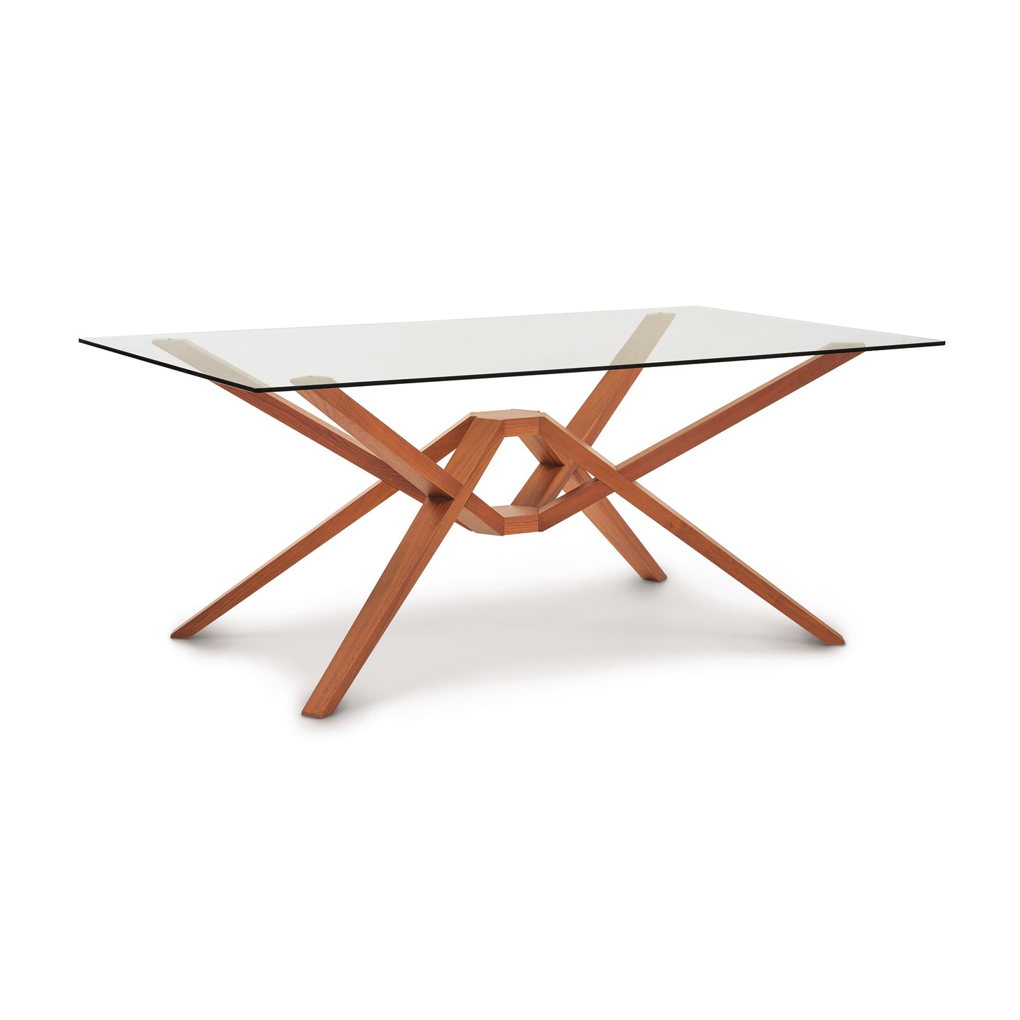 Exeter Rectangular Glass Top Table by Copeland Furniture showcasing a striking geometric hardwood base and clear glass top, expertly crafted from sustainable wood.