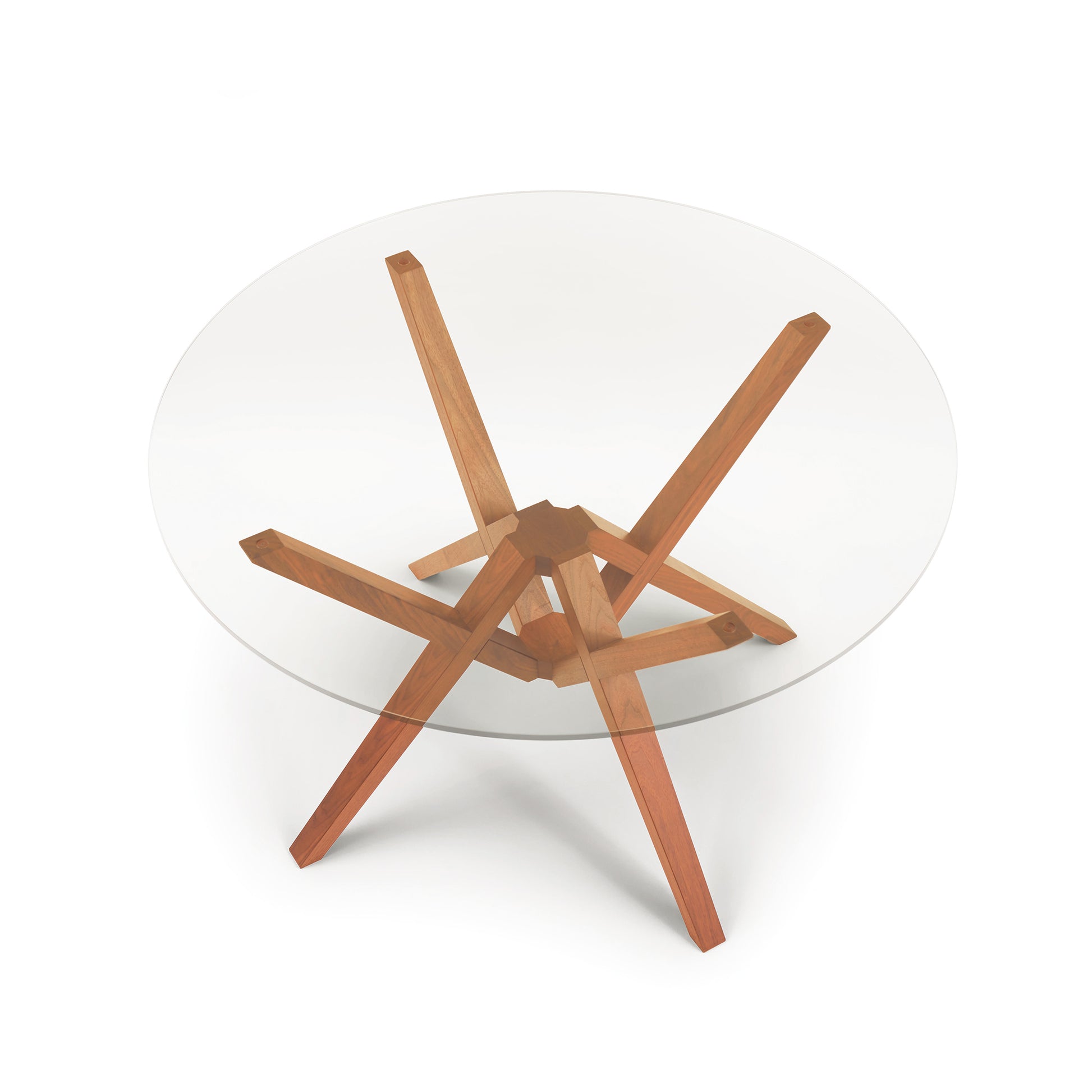 Exeter Round Glass Top Table by Copeland Furniture with geometric hardwood base, viewed from above.