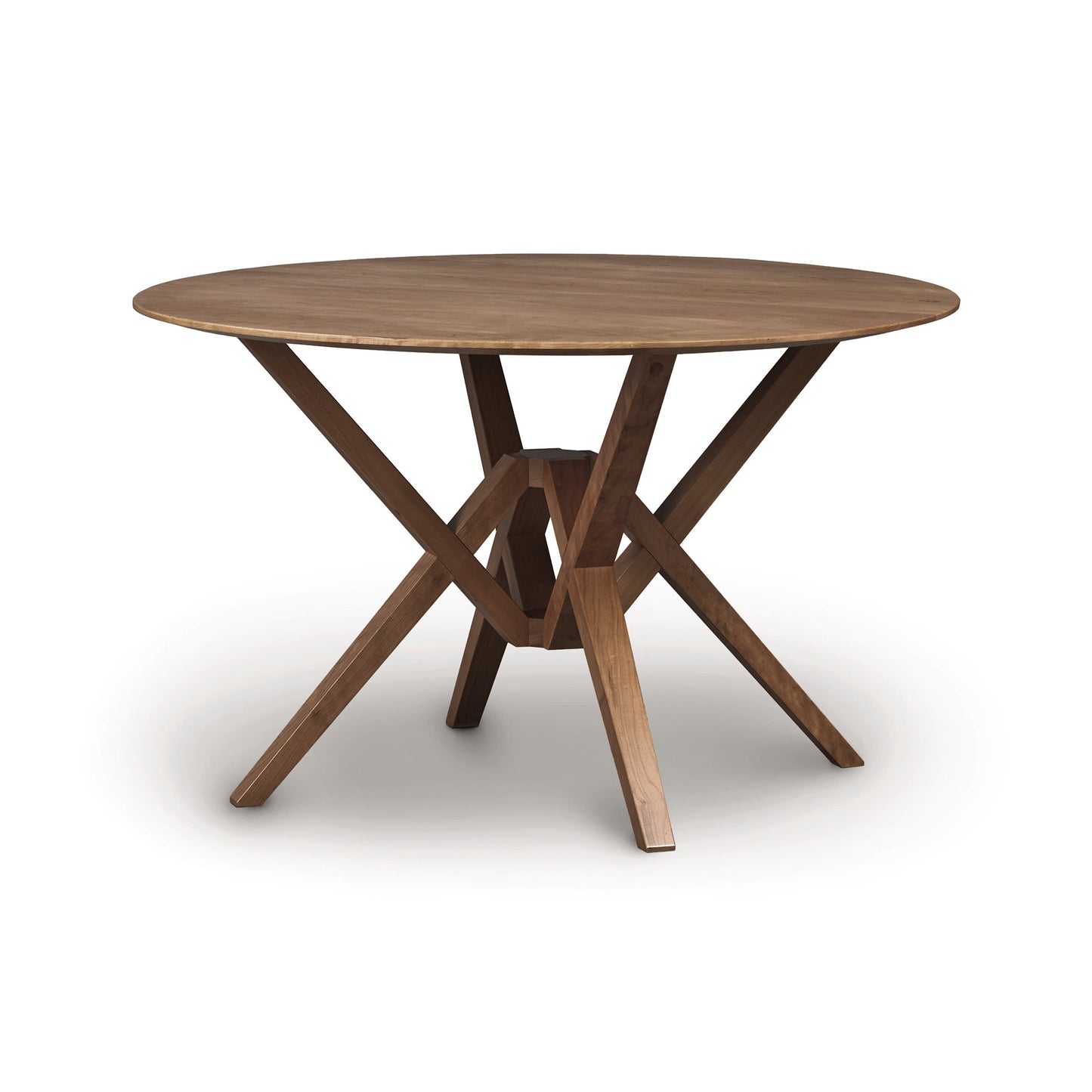 Exeter Round Solid Top Dining Table by Copeland Furniture with geometric hardwood base, showcasing fine craftsmanship and natural wood grain.