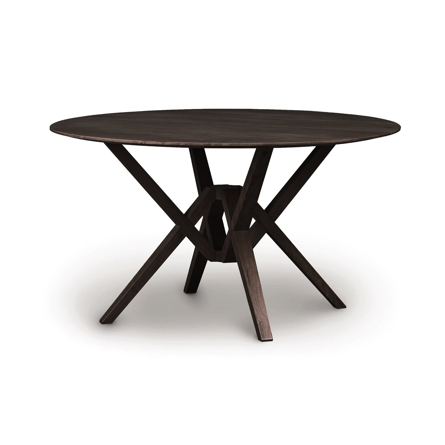Exeter Round Solid Top Dining Table by Copeland Furniture with a dark hardwood top and striking geometric base, showcasing fine craftsmanship and modern design.