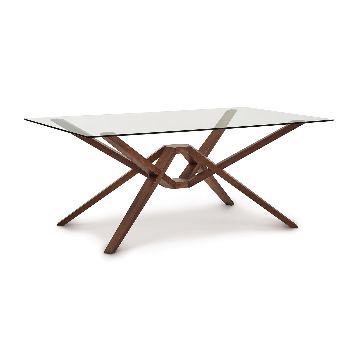 A modern Copeland Furniture Exeter Rectangular Glass Top Table with a solid wood base featuring an intersecting support design on a white background.