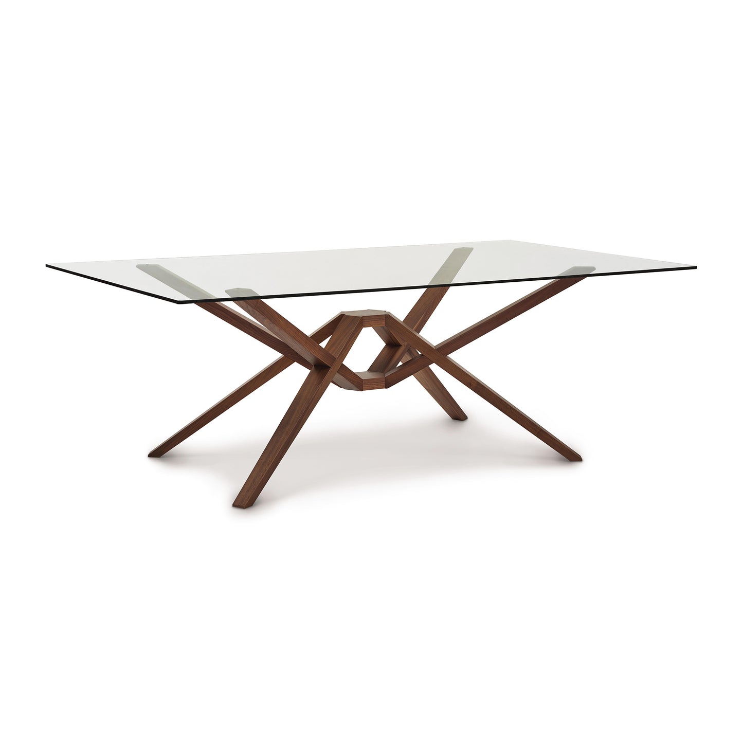 An Copeland Furniture Exeter Rectangular Glass Top Table with a wooden base featuring an intricate crossing design crafted by Vermont craftsmen on a white background.
