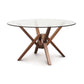 A Copeland Furniture Exeter Round Glass Top Table with a solid wood cross base design on a white background.