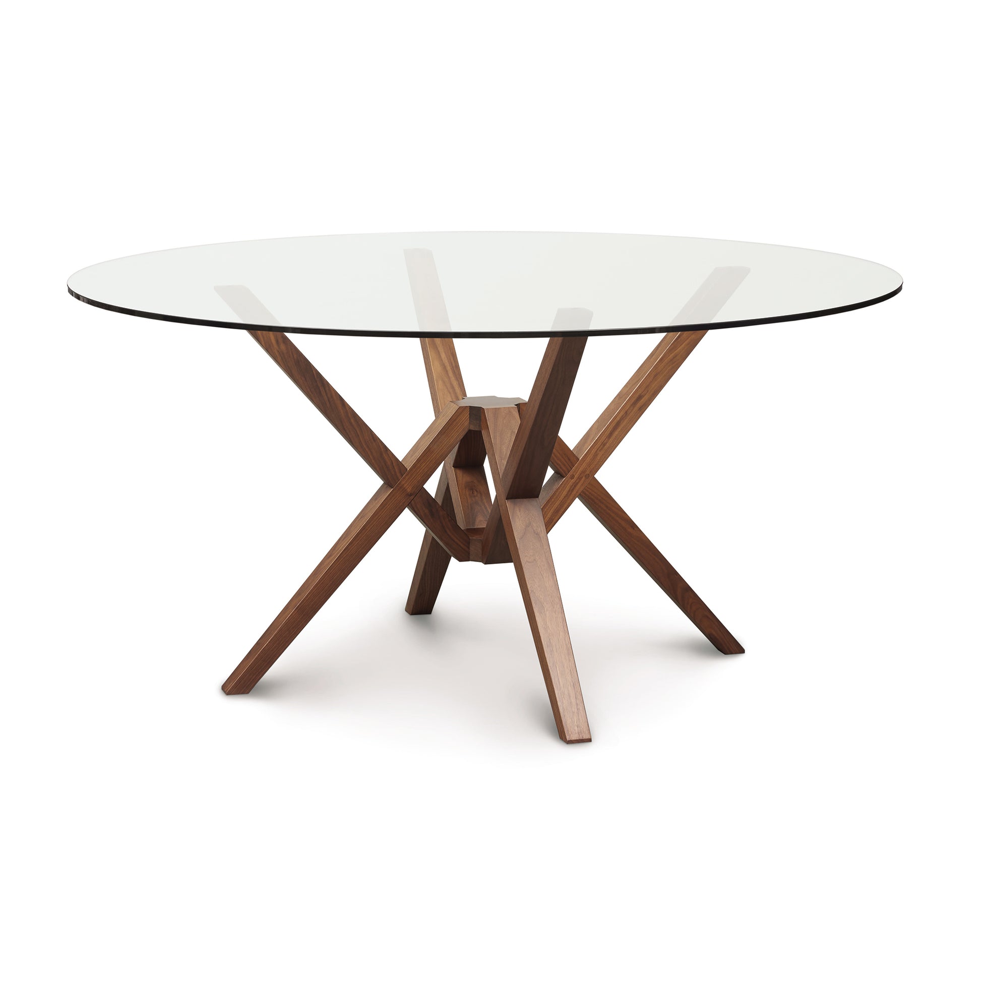 Exeter Round Glass Top Table by Copeland Furniture with a sculptural solid wood base and angled legs, expertly crafted in Vermont.